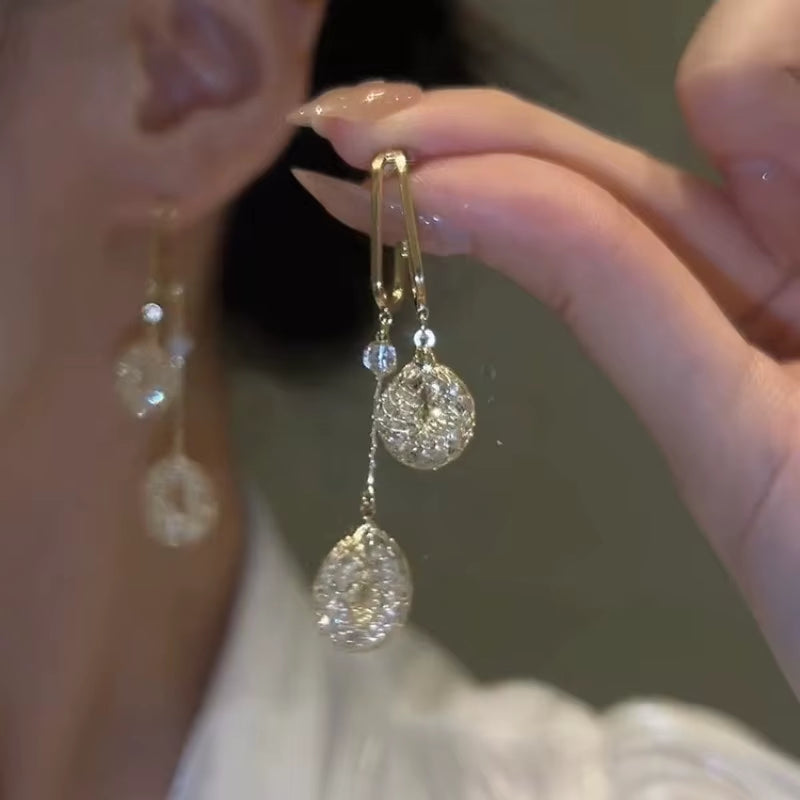 S925 Silver Needle Douyin with Hollow Water Drop Long Tassel Earrings Female Light Luxury Temperament All Fashion Accessories